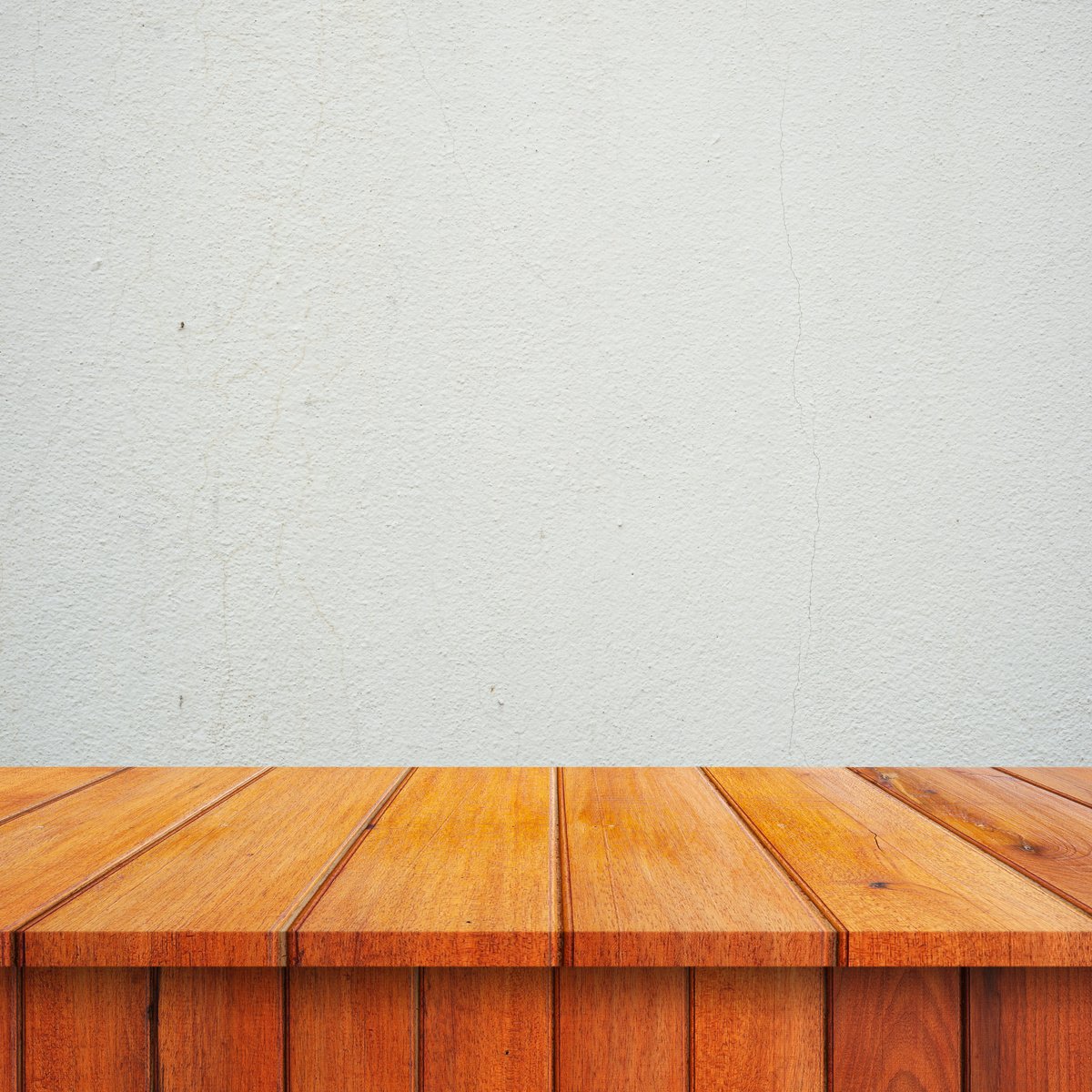 Wooden Table against Cement Background 